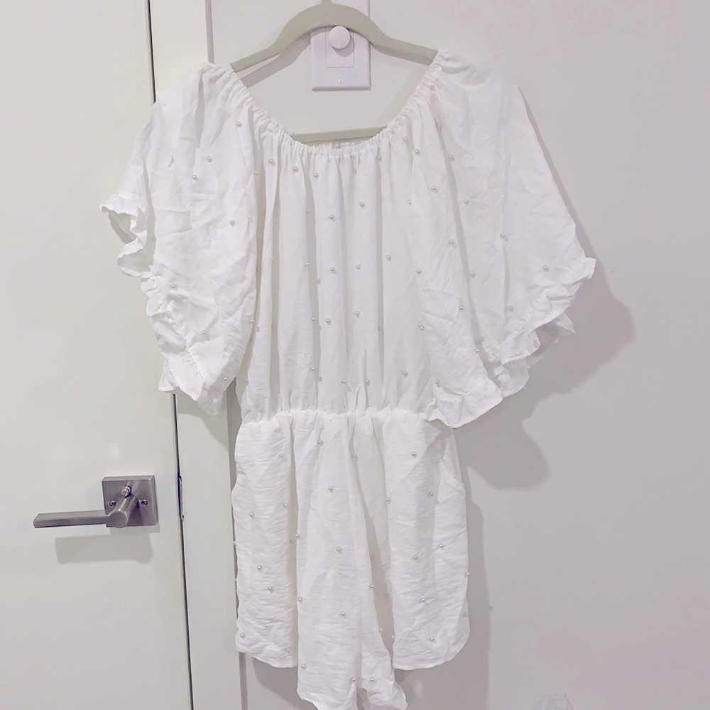 Off the shoulder ruffle sleeve white romper